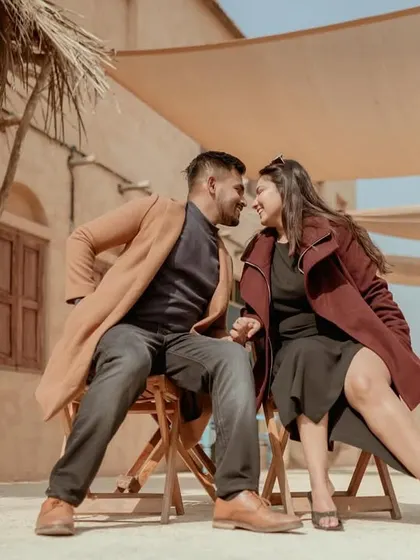 A playful and interactive moment from the desert-themed coffee date shoot.