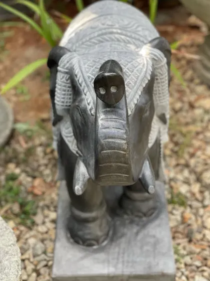 A frontal view of our grand elephant statue, highlighting the life-like proportions and exquisitely adorned details.