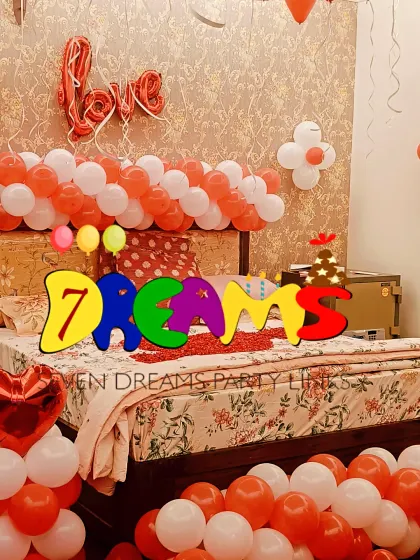 A romantic surprise room decoration I put together. This setup includes red and white balloons, a 'love' foil balloon over the bed, and floor arrangements to create a special, intimate atmosphere.