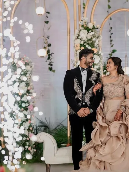 A stylish reception look. We love capturing the glamour and fun of the evening party, from the designer outfits to the happy, candid interactions.