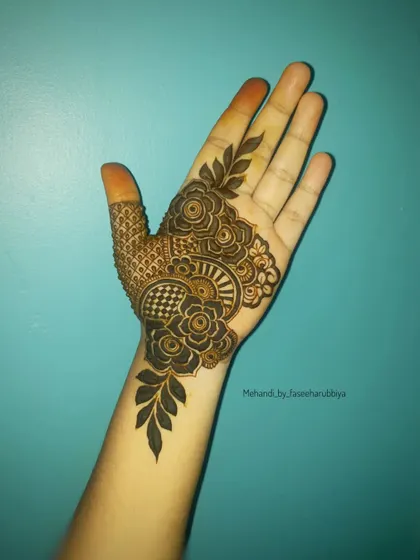 The design in an earlier stage, showing just the palm work.