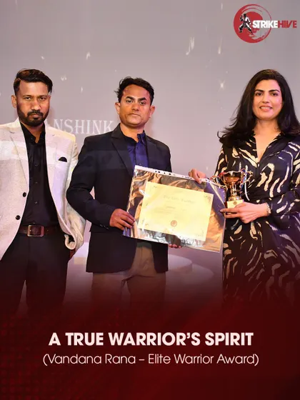 A student receives the "Elite Warrior Award," a recognition of her true warrior spirit.