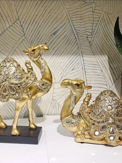 Another angle of the stunning mirror-work camel pair, showcasing the intricate details and craftsmanship.