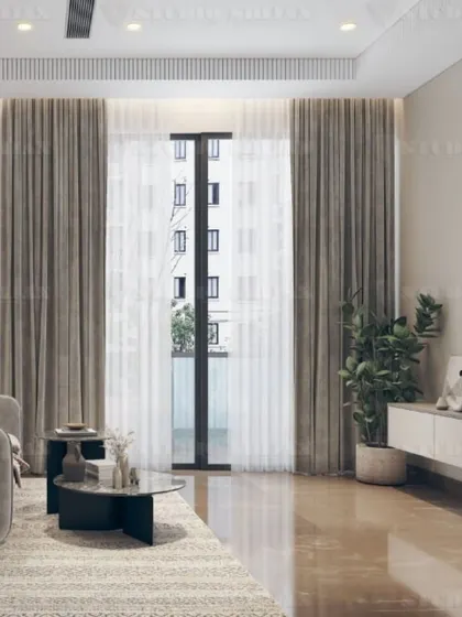 The TV and window side of the DLF bedroom, showcasing the simple, elegant console and the use of sheer and blackout curtains for light control.