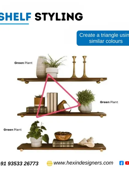 When styling shelves, we create visual triangles using color. Repeating a color, like the green from the plants, in a triangular pattern across different shelves guides the eye and creates a cohesive look.