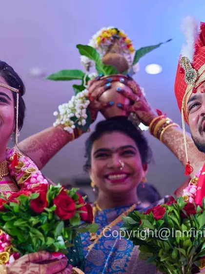 Weddings are about family. This photo captures a fun, interactive ritual involving a family member, resulting in genuine laughter from everyone.