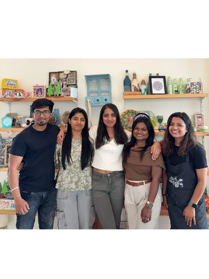 A group of friends posing with me after a successful moon lamp workshop in my studio. I love hosting private events and sharing my passion for art.