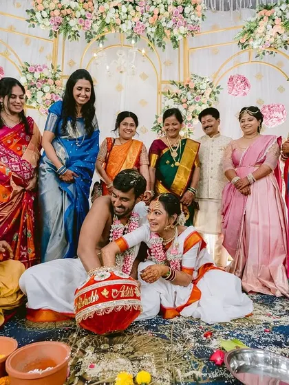 The entire family joins in the fun of the wedding games, creating a lively and memorable scene.