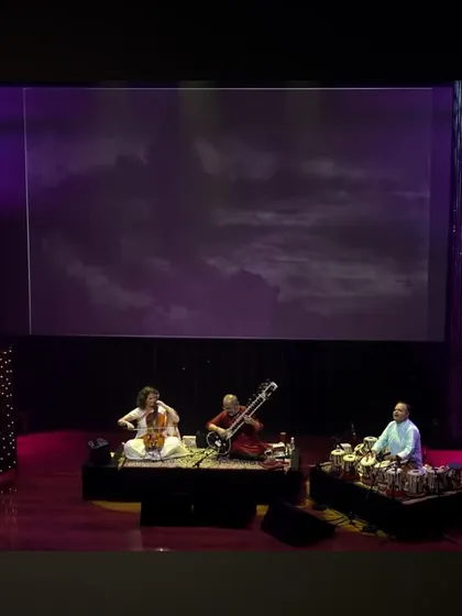 A beautiful stage setup at the Nita Mukesh Ambani Cultural Centre, with paintings projected behind us. This "See the Music, Hear the Paintings" concept adds a wonderful visual layer to the performance.