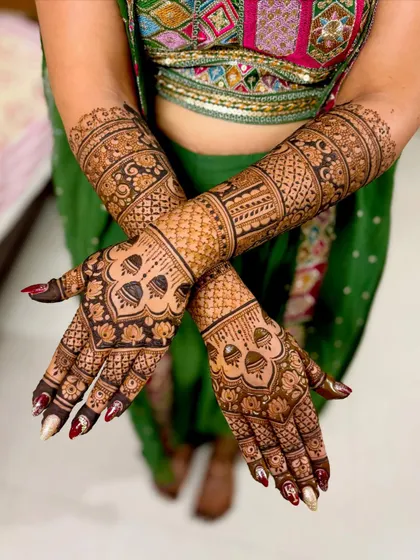 A lovely bridal design with a focus on floral and architectural motifs.