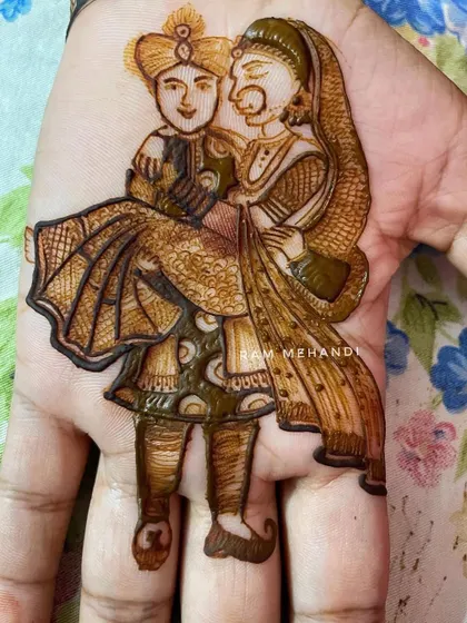 The finished portrait of a groom carrying his bride, filled with intricate shading and detail. This is a popular and romantic pose that I can customize for your mehndi.