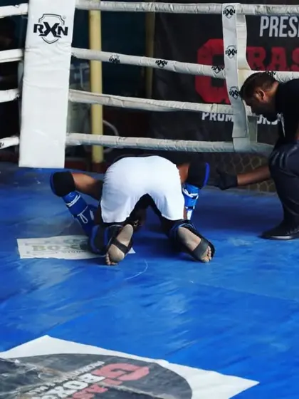 The referee administers a count after a knockdown. This demonstrates the power and effectiveness of our striking training.