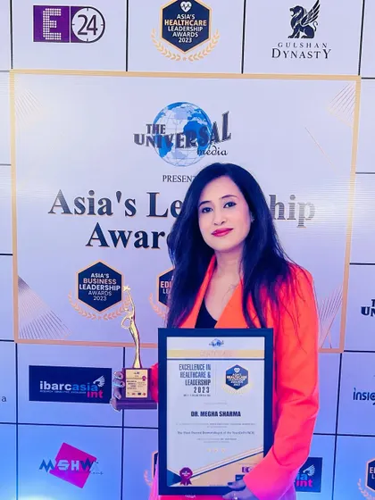 Proudly holding my award for excellence in Dermatology. This award for being The Most Trusted Dermatologist of the Year (Delhi/NCR) is especially meaningful as trust is the foundation of my practice.