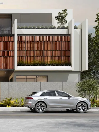 Another view of the 'House of Courtyards' residence, highlighting the interplay of materials. The design uses landscaped terraces and strategic openings to ensure the home is both private and connected to its environment.
