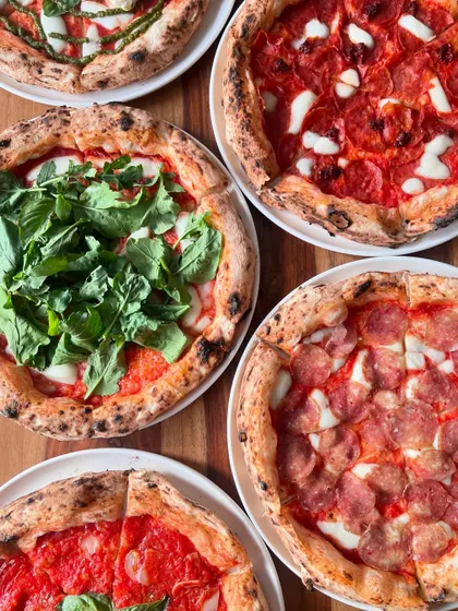 A Sunday kind of love. A beautiful spread of our meat and veggie pizzas.