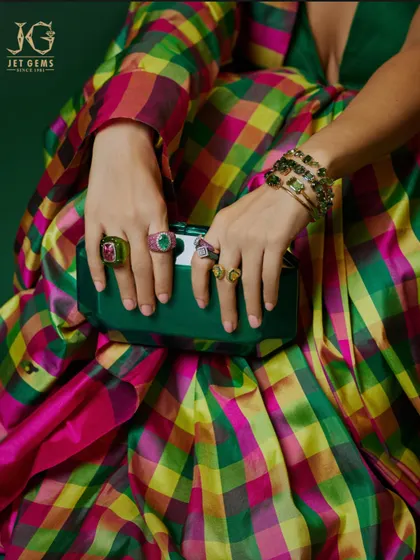 Beauty captured in technicolour. A close-up of the kaleidoscopic rings and bracelets worn by Bhumi Pednekar, showcasing a playful yet luxurious mix of colourful gemstones.
