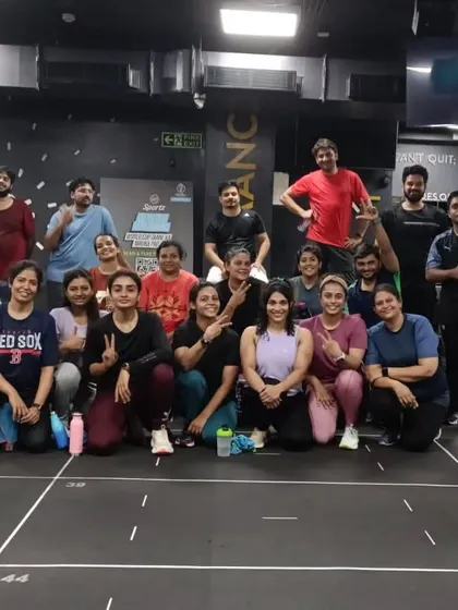 The heart and soul of my classes. Each photo captures a unique moment with my incredible community after a sweaty, joyful session. This is our shared victory lap.