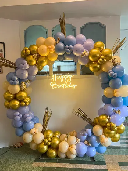 Another look at this popular pastel and gold balloon ring design. It's a versatile backdrop that works well in different spaces and can be customized with different colors to match your party's theme.