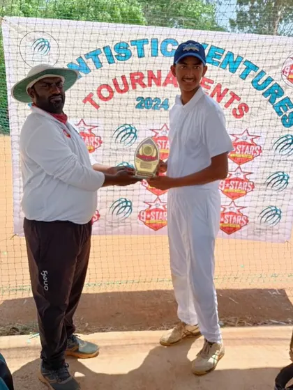 Shourya Tandon receiving an award for his half-century in the U-16 Summer Cup.