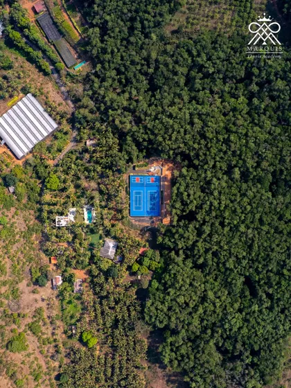 An aerial view of our training base in Goa. A world-class court hidden within a lush landscape, providing a focused environment away from distractions. This is where the grind happens.