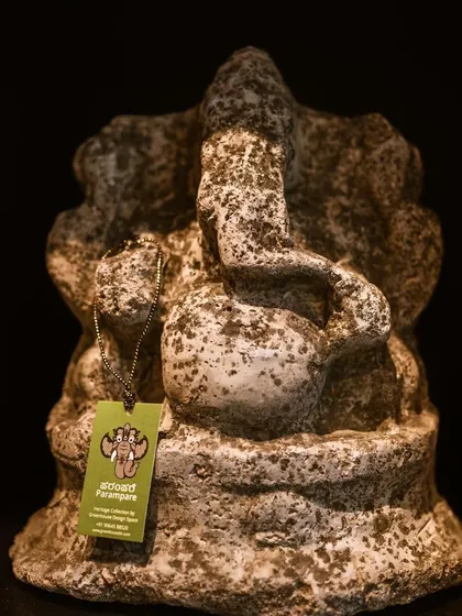 A rustic stone Ganesha, showcasing the raw texture of the material. This piece is a testament to the unique, hand-picked art I curate, each with its own story and character.