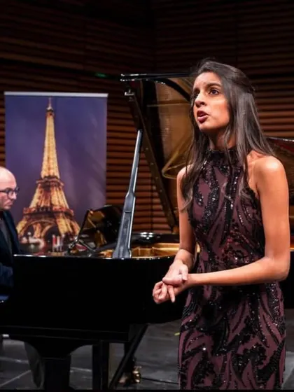 We celebrate the remarkable achievements of our students on the world stage. Here, our gifted voice student performs at the Opera Bastille in Paris after winning a prestigious international competition, a proud moment for our entire community.