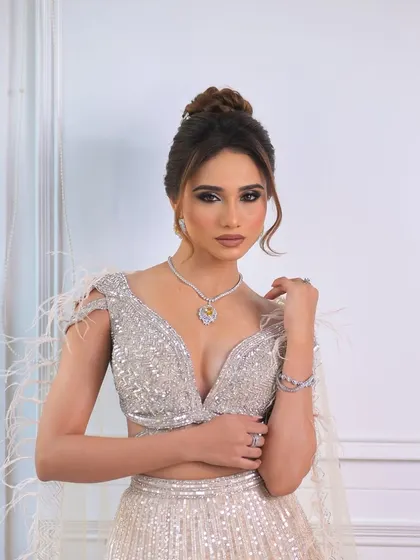 A confident pose that exudes glamour and style.