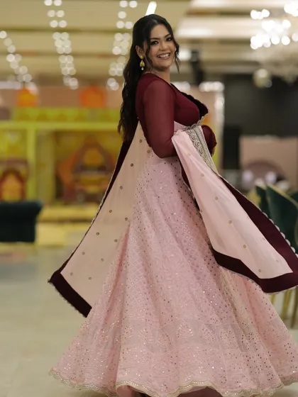 A fun twirl to show off the beautiful flare and intricate work of the lehenga skirt. Fashion should be joyful!