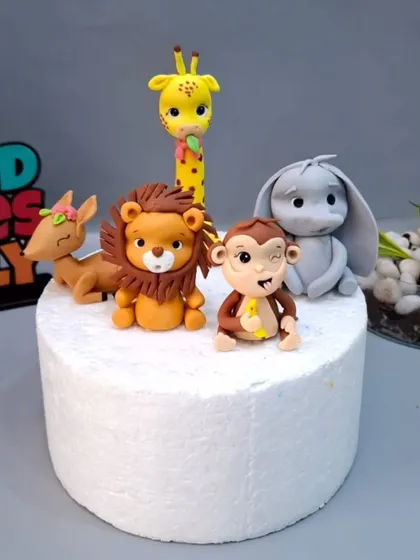 All five fondant animals from our jungle masterclass, ready to bring any cake to life.