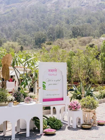 A welcome sign in Hindi and English greets guests at the Bhaat and Mehendi ceremony.