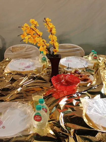 A unique golden-themed table cover, ready for the dastarkhwan, showing our ability to cater to traditional dining styles with an elegant twist.