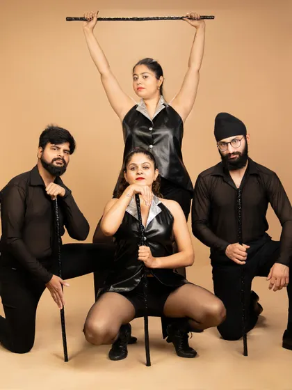 A powerful group pose from our 'Age of Jazz' production. This piece explores the history of jazz dance, from its roots to its evolution into a premier Broadway style.