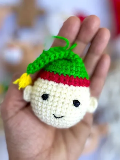 These mini Christmas ornaments are perfect for decorating your tree. The set includes tiny versions of Santa, reindeer, elves, and gingerbread men, all handmade with love.