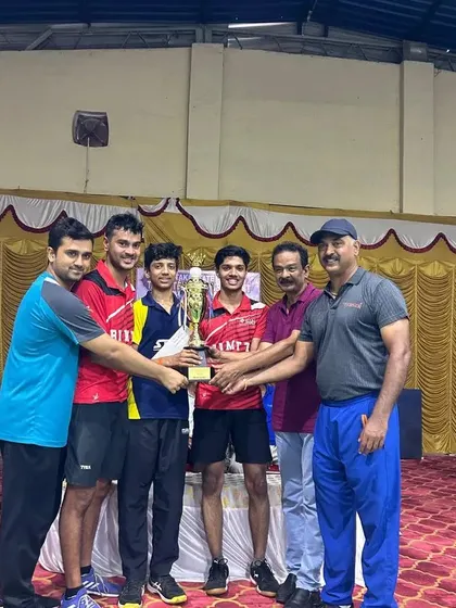 The victorious BNM team celebrating their Team Champions trophy at the state ranking tournament in Hospet.