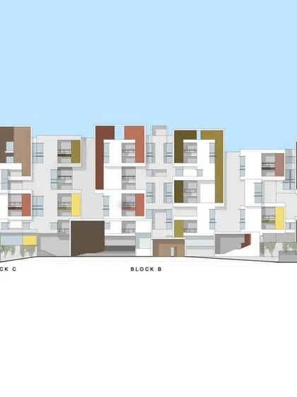 The building elevation drawing, showing the varied composition of blocks and colors that gives the facade its unique character and breaks down its scale.