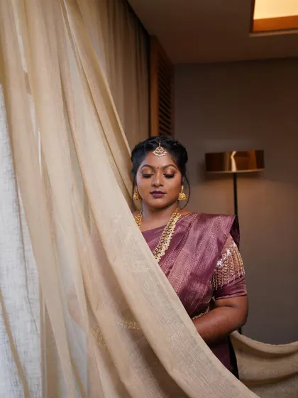 Dr. Preetha's engagement look, captured beautifully. The makeup was designed to be dramatic yet elegant, perfect for the occasion.