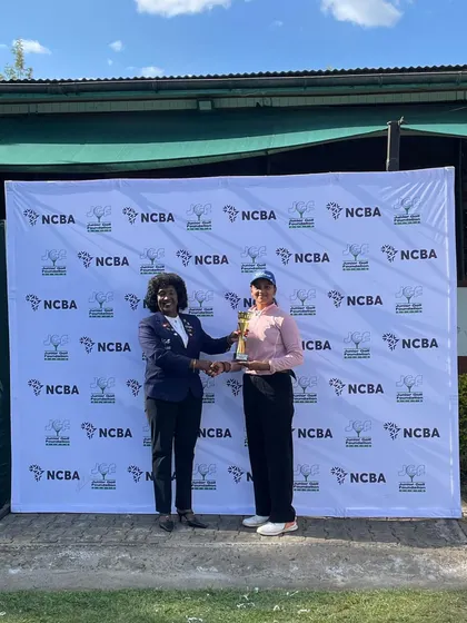 Riddhima Singh receives her trophy at the 1st NCBA Central Rift Junior Open Golf Championship in Kenya, where she secured 1st place in her age category and 2nd overall.