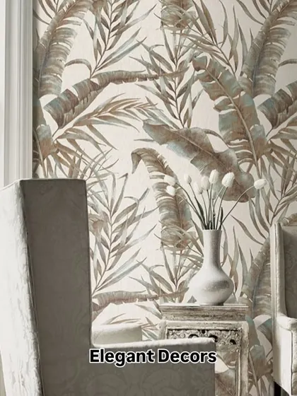 This tropical leaf pattern wallpaper is perfect for creating a calm and refreshing accent wall. The muted, earthy tones make it a versatile choice that pairs well with modern furniture.
