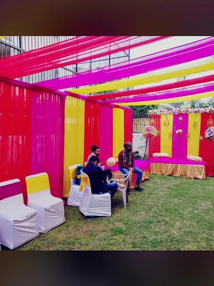 This setup combines traditional low seating with standard chairs for guests, catering to everyone's comfort.
