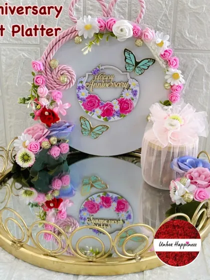 This elegant anniversary gift platter is decorated with flowers and butterflies, creating a beautiful keepsake display.