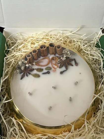 A close-up of the spice and herb arrangement on the 6-inch urli candle. I use real cinnamon, star anise, cardamom, and cloves.