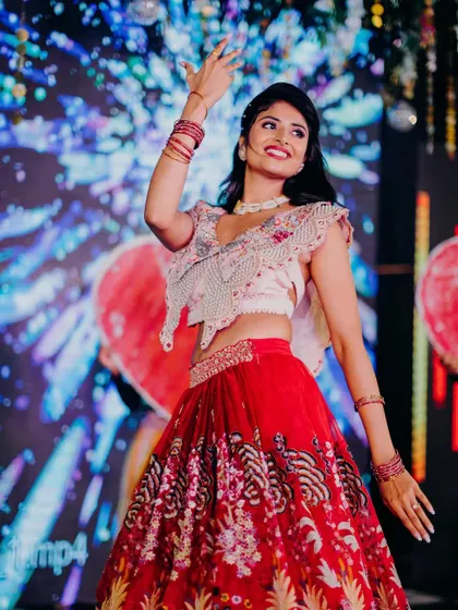 A fun, candid shot from a dance performance. The makeup is set to stay put through all the festivities.