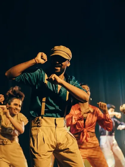 The joy and energy of our Soul & Locking performance, inspired by the 70s, shines through in this shot.
