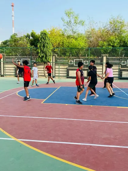 A player takes a shot from the perimeter.