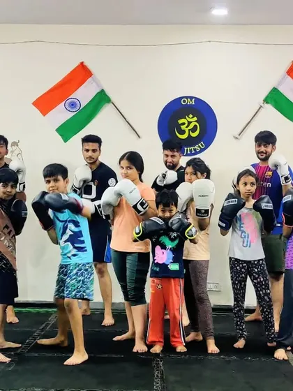Everyone with their guard up, ready to train. This picture shows the discipline and focus we instill in all our members, young and old.