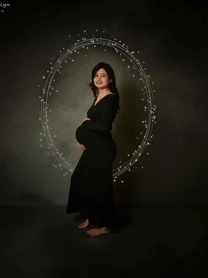 Here, I've added a delicate ring of light to the background, creating a subtle halo effect that elevates this simple portrait.