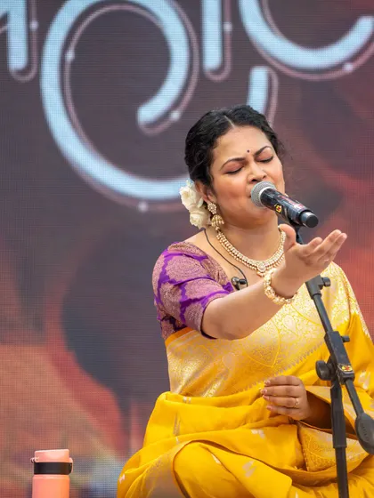 Priyanka Barve lost in her performance, with the rich colors of her outfit shining under the stage lights.