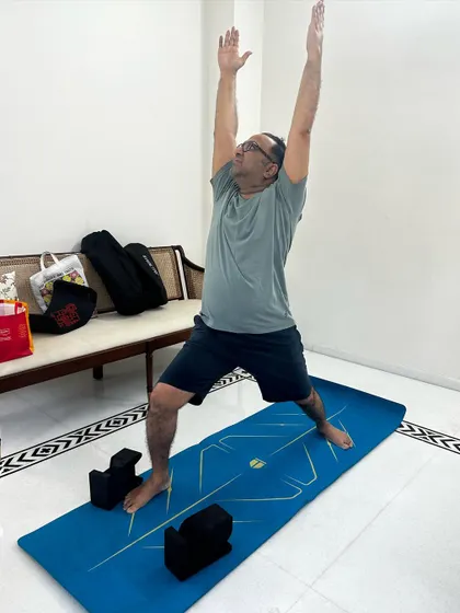 A powerful Warrior I pose from my client who is managing Gout. Building strength in the legs and stability in the hips is a key part of his journey back to normal movement.