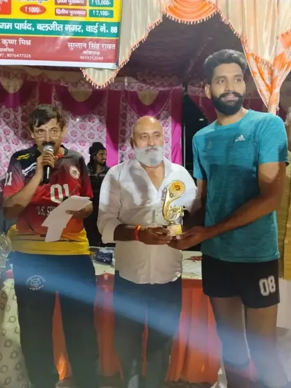 One of our senior players receiving an award at a tournament. Recognizing individual performance is part of celebrating the team's overall success.