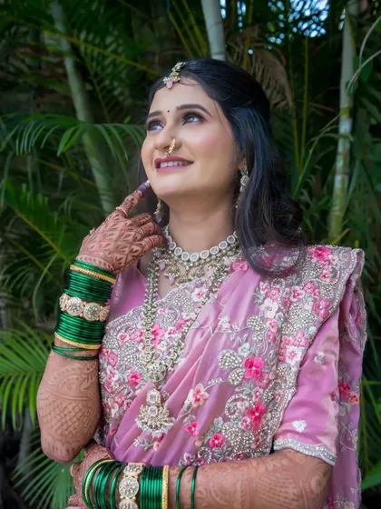 A thoughtful and elegant bridal portrait, with the bride looking up, her expression full of dreams for the future.